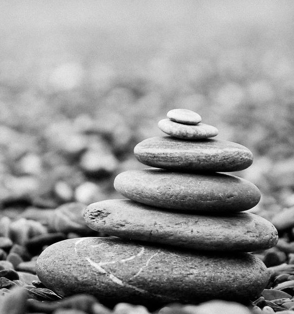 Balanced stack of stones, largest at the base